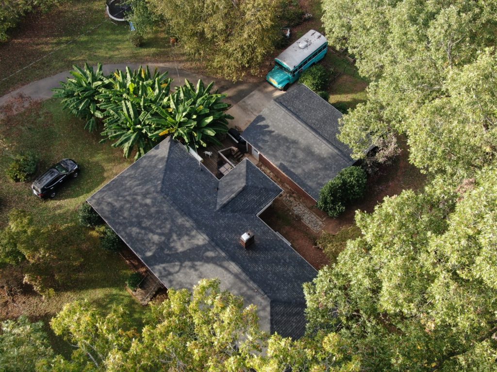 Drone photo of new roof replacement with black shingles