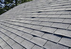 Curling shingles on a roof