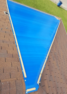 How to Tarp a Roof - Signature Exteriors