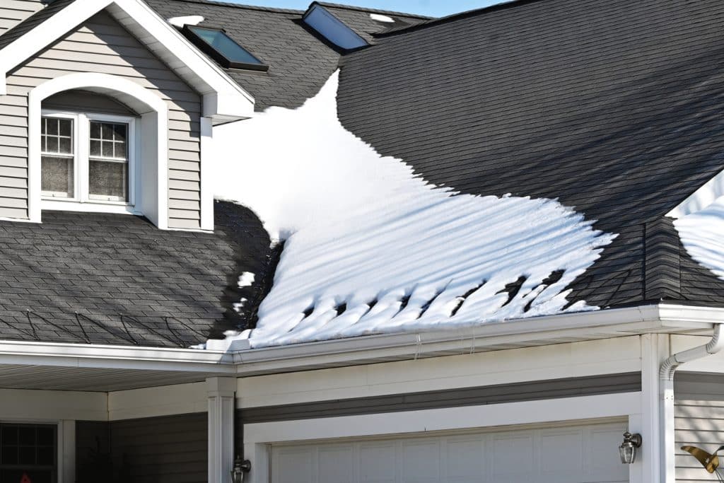 Heated wires or tape on the roof to melt snow or ice.
