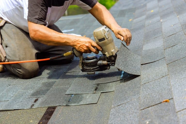 Roofer-repairing-roof