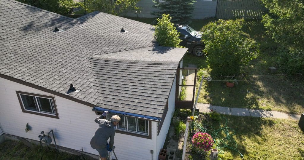 Man-fixing-roof